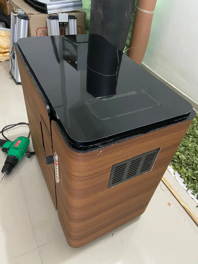 An oxygen concentrator built by the Tech4Biz team, standing on the workshop floor